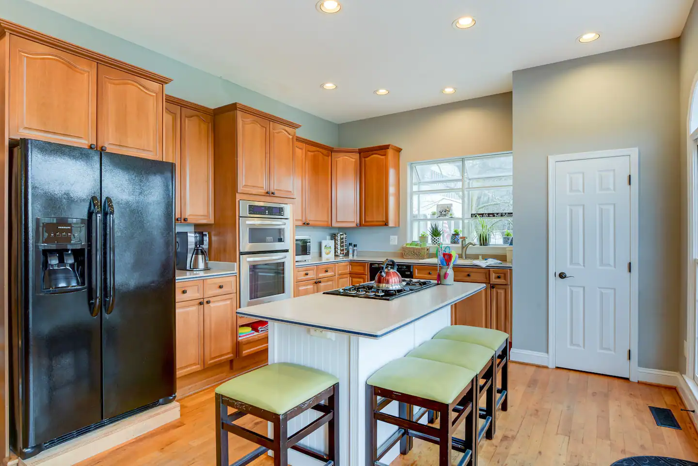 A chic kitchen fully-equipped with all the kitchen needs.