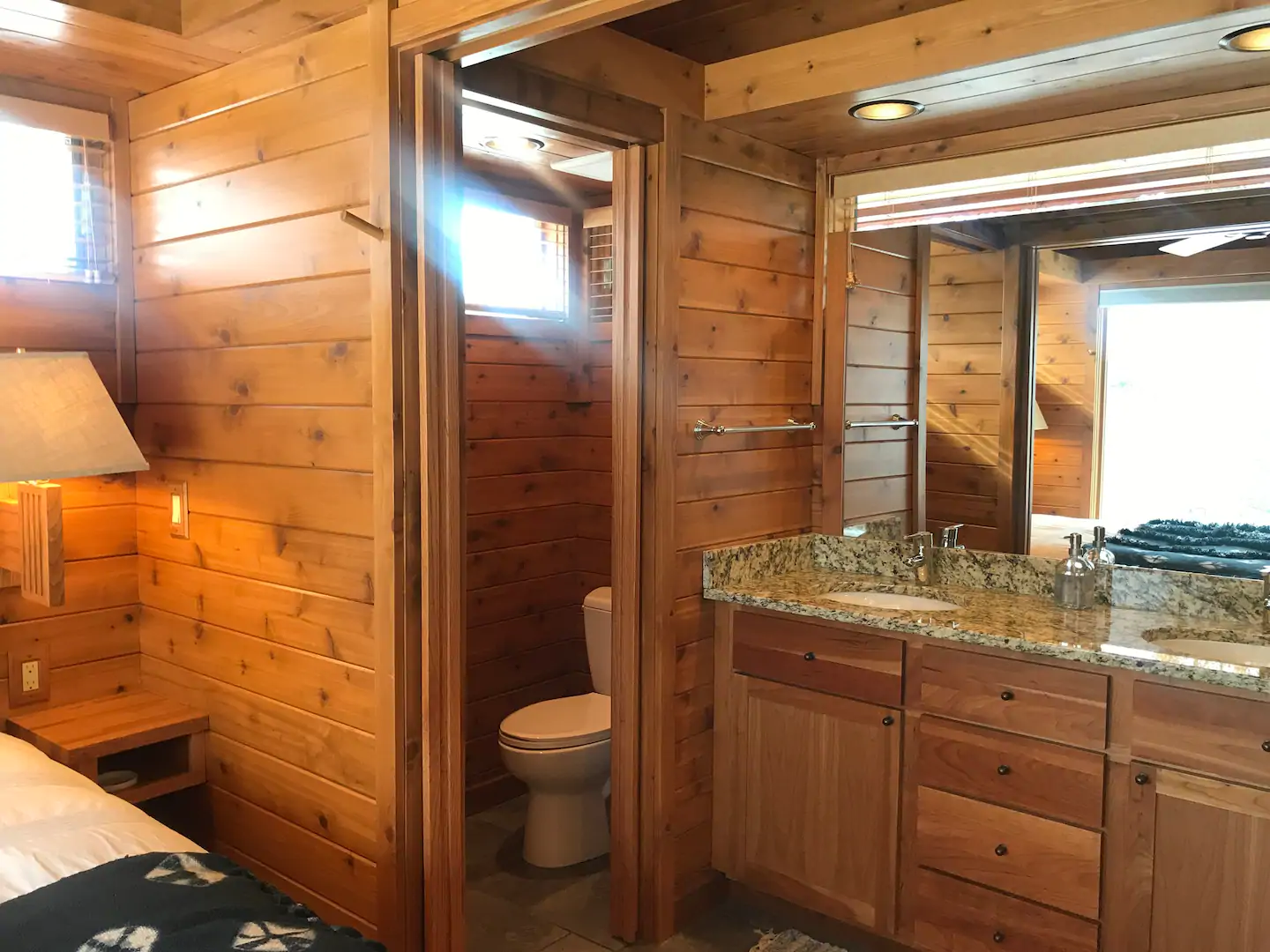 Extra privacy is provided by pocket doors between the bedroom and the living area, as well as between the vanity and the toilet.
