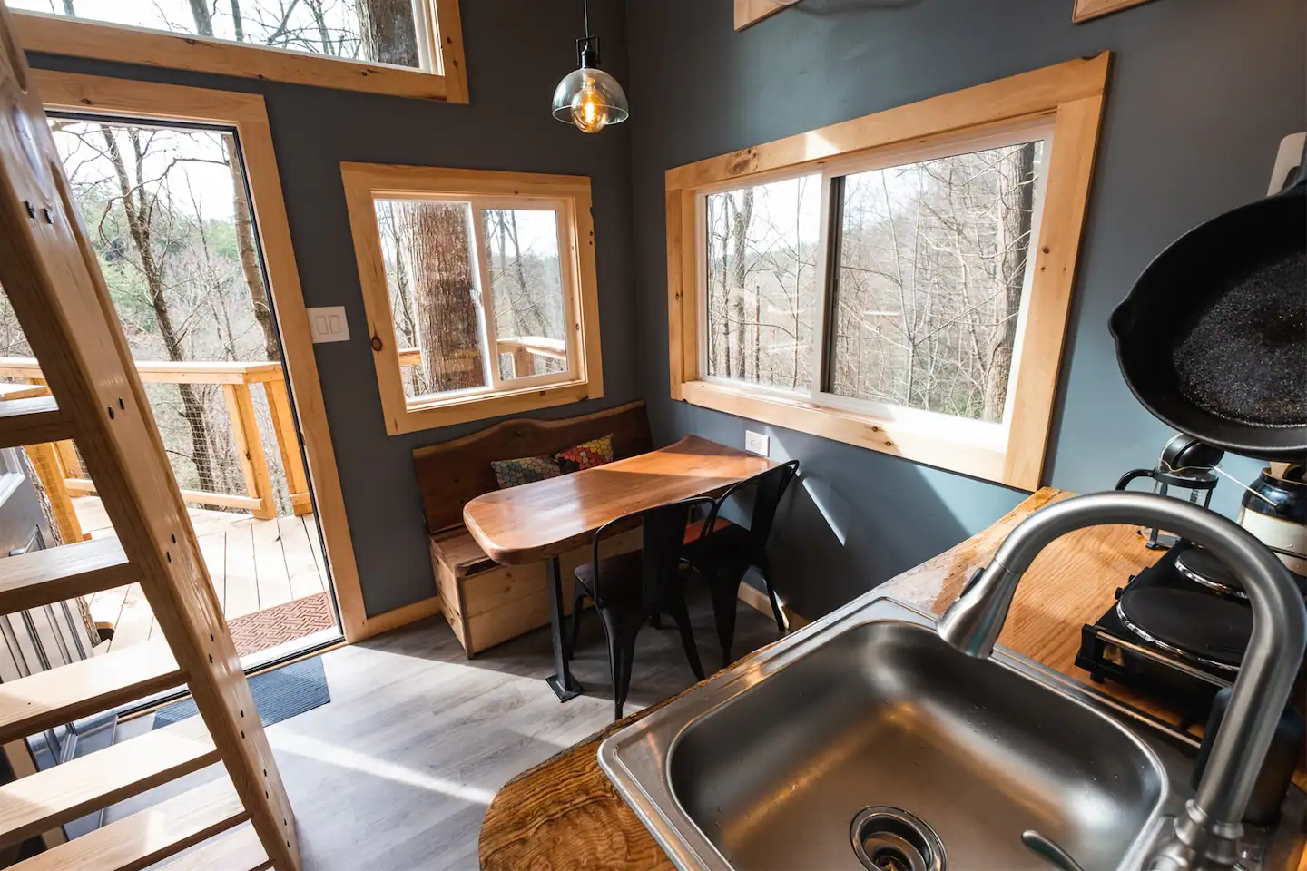 The kitchen features huge windows that bring in plenty of natural light.