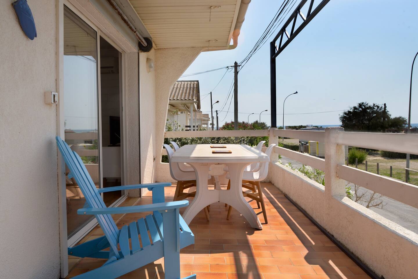 Large terrace with dining table.