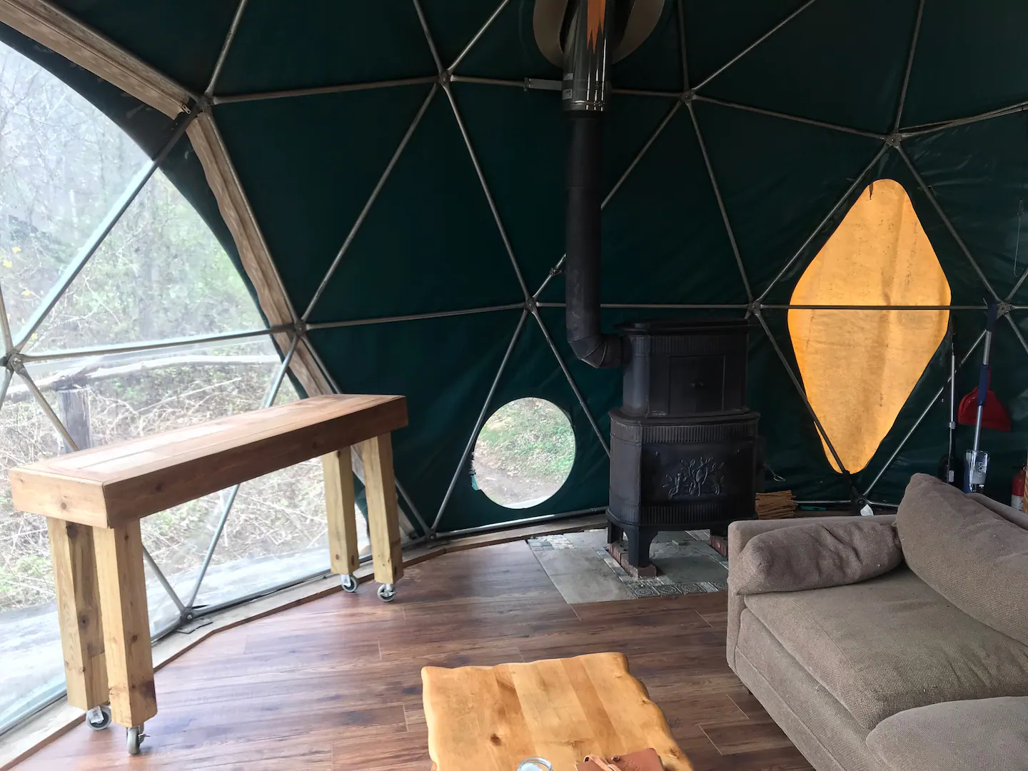 It's insulated and warm, with a heater and hot water!