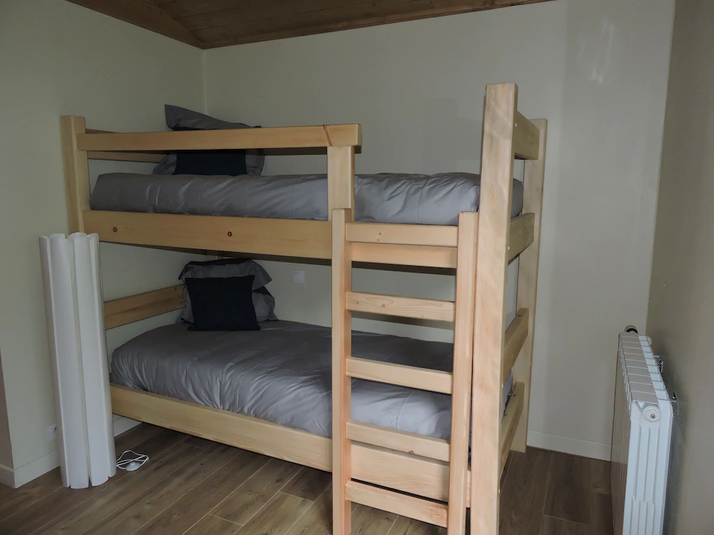 1st floor bedroom with a double-deck bed