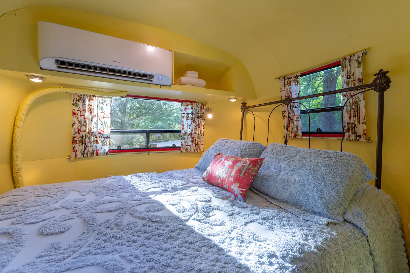 Our bed is made out of a queen memory foam mattress on an antique iron bed frame.