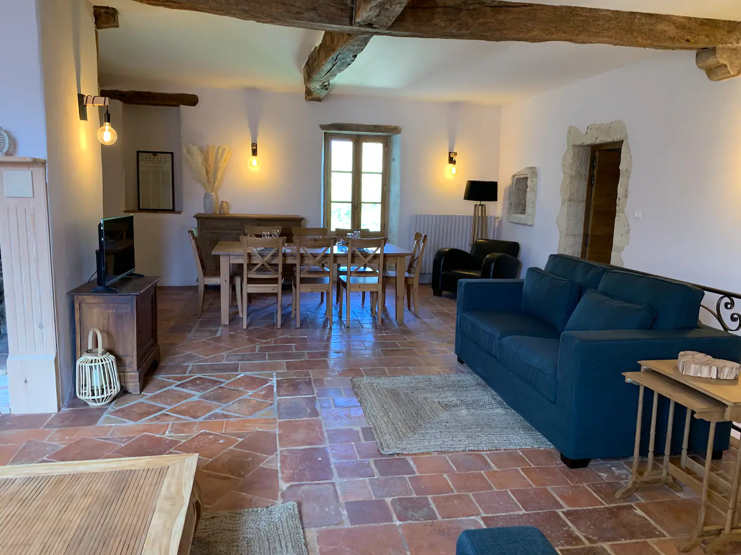 The central fireplace and the library in the living room provide distinct places to unwind.