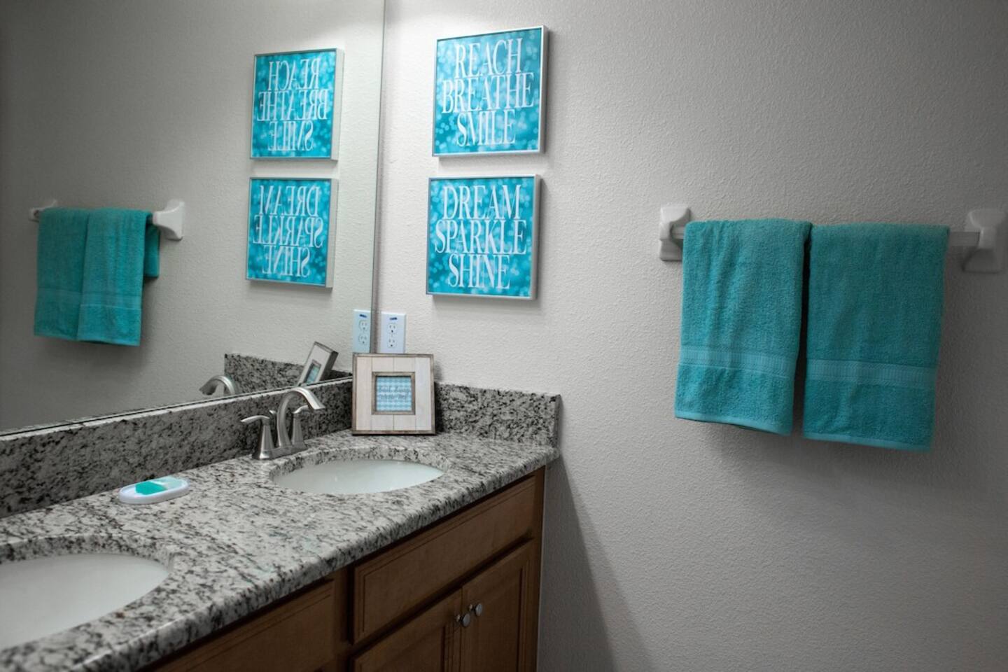 Each bathroom has roll of toilet tissue and a bar of soap and shampoo