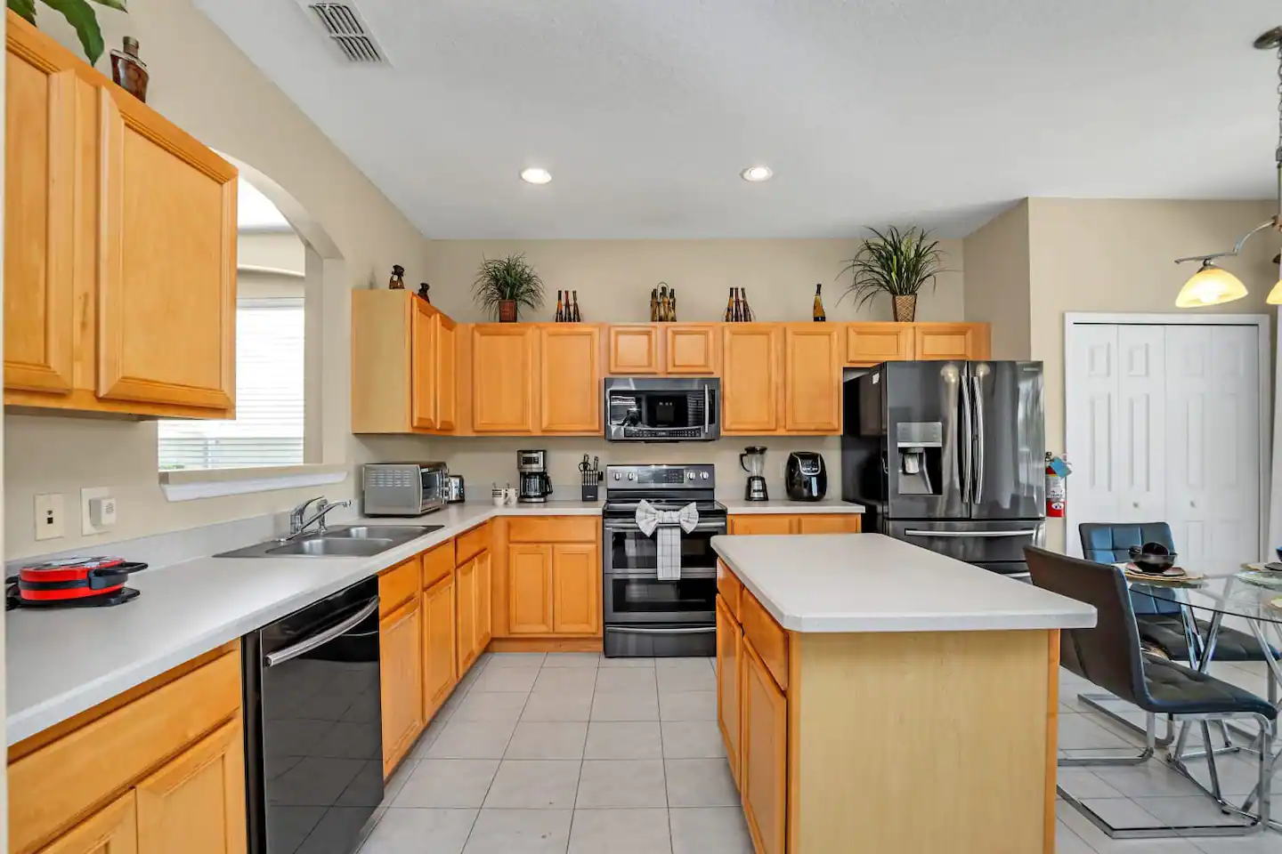 Large kitchen full of culinary needs.