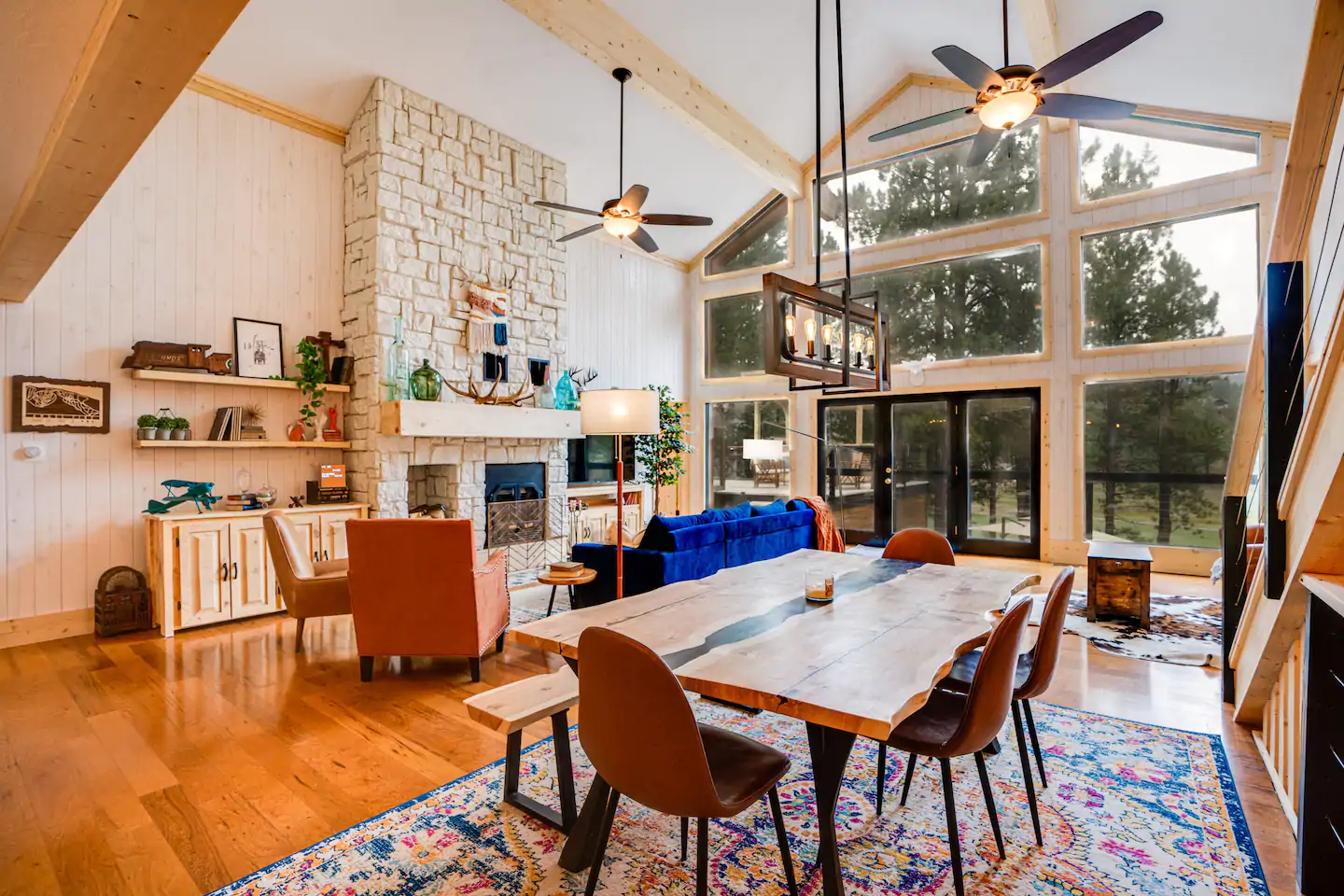 Family room with fireplace and high ceilings.