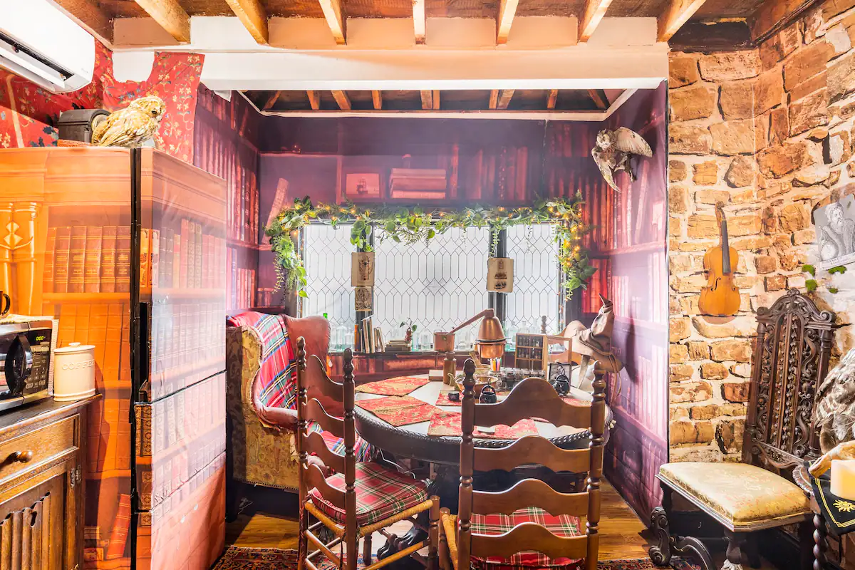 Indulge in a magical dining experience at the Salem School of Witchcraft's dining room.