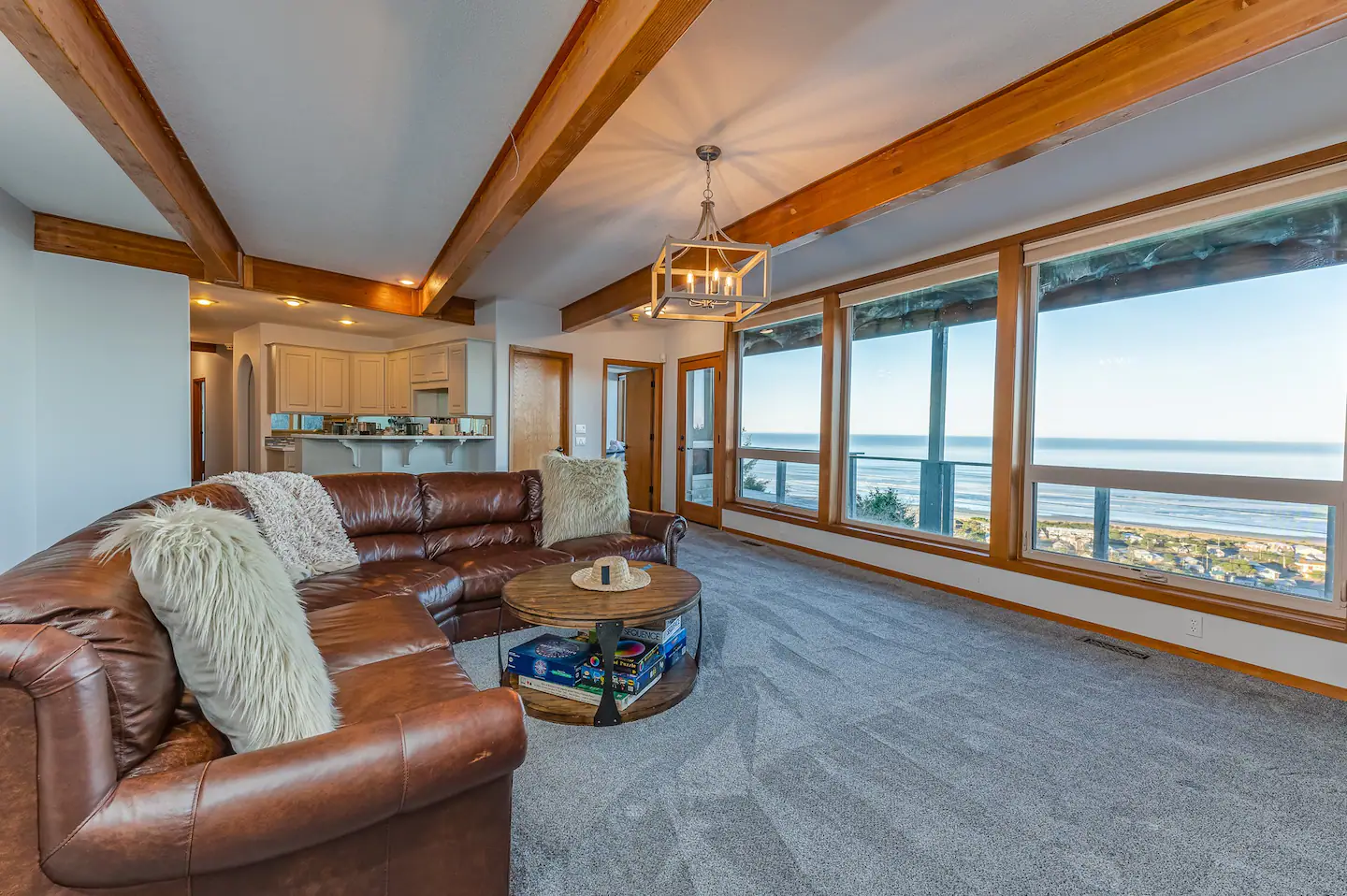 Comfortable leather seating offered on the second living room (2 of 3).