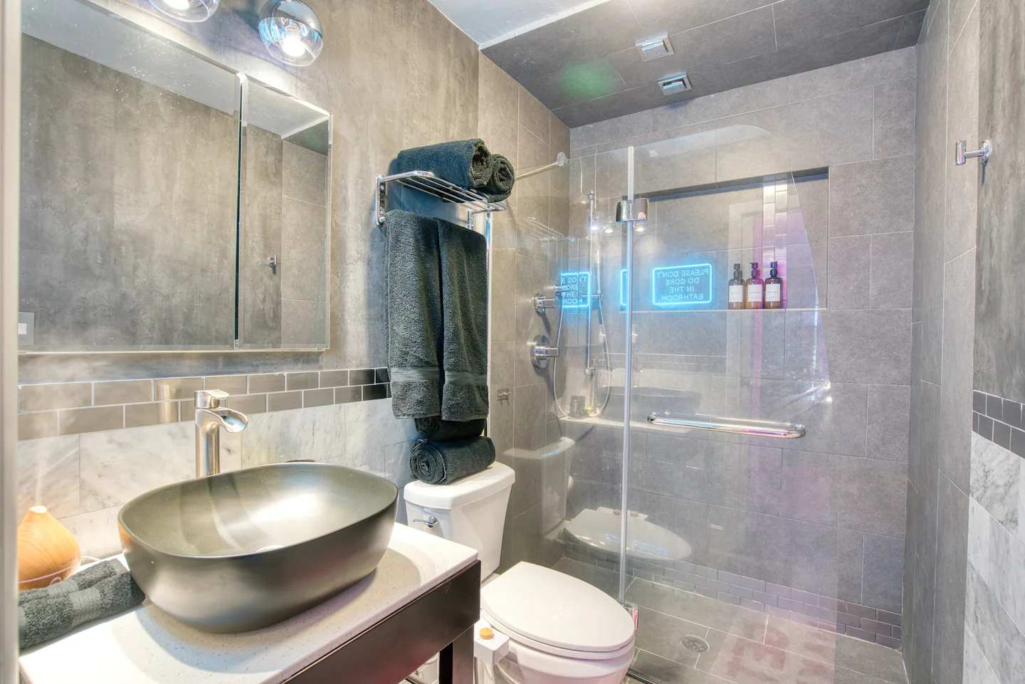 Large space for bathroom with great shower.