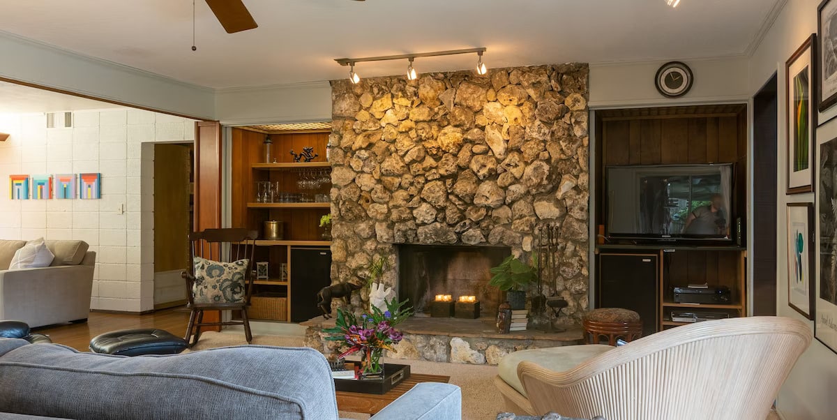 Family room fireplace, TV and bar