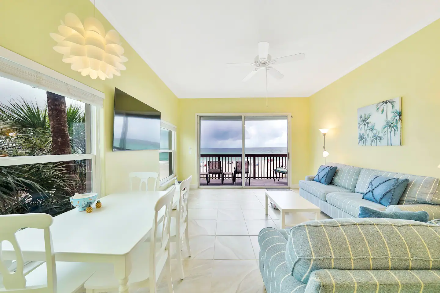 Spacious living area with access to balcony.