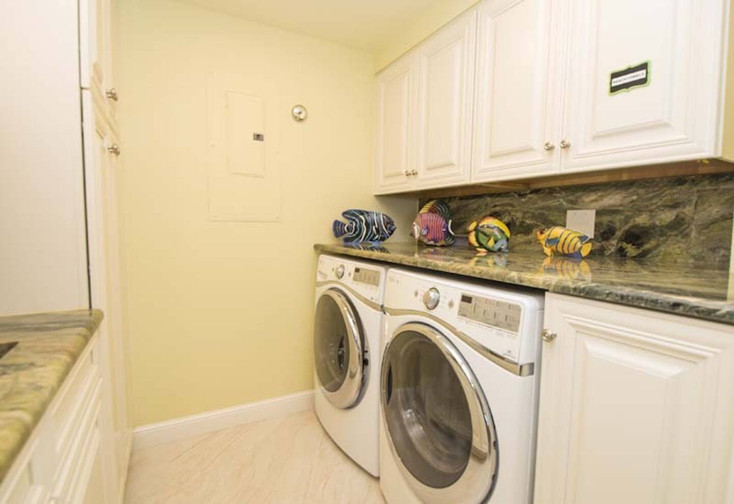 Unit has its own laundry room with a washer and dryer.