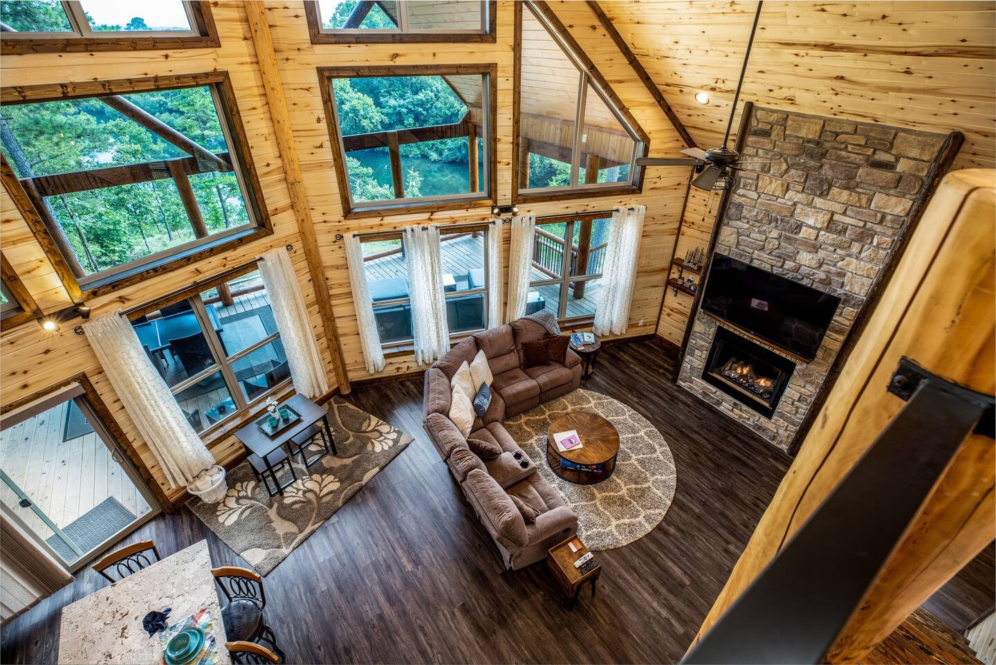 Snuggle up by the fire and watch a movie or gaze out at the river/forest enveloping you.