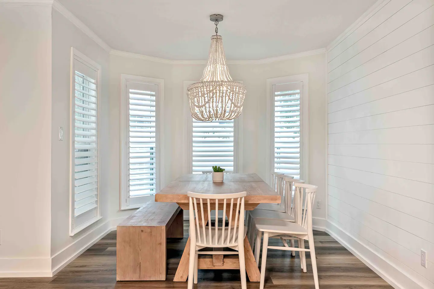 Dining area accommodating large group of individuals.