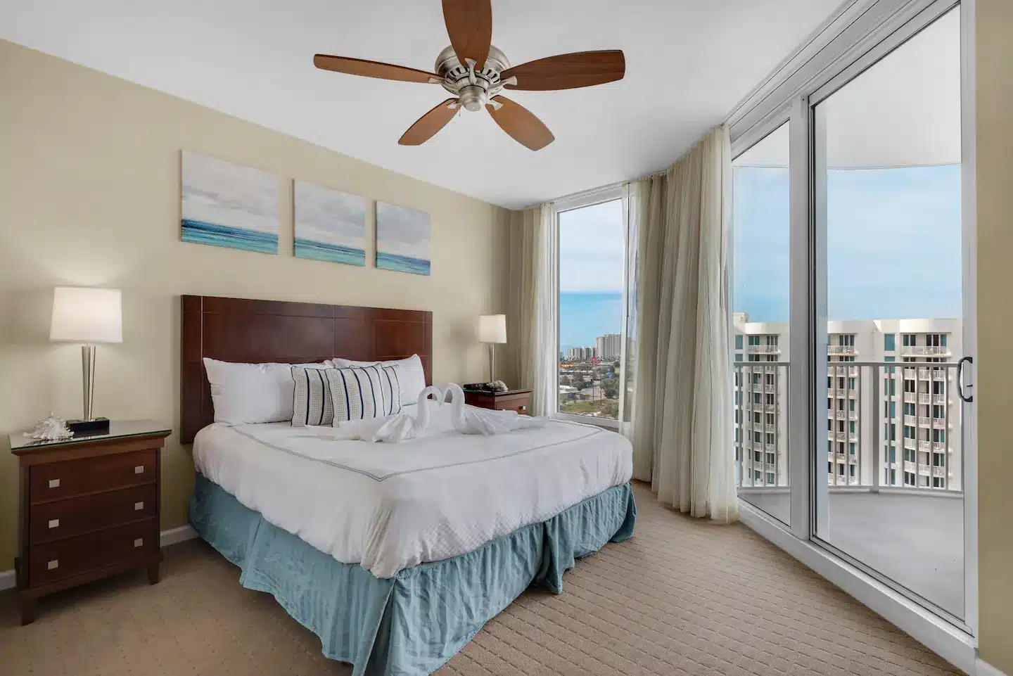 Master bedroom includes king-size bed and private TV