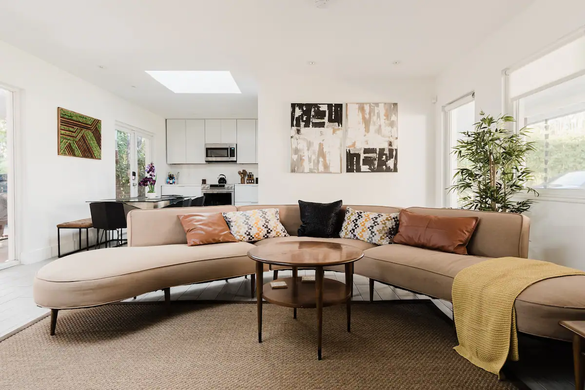 As soon as you step foot in the beautiful home, you're welcomed by a stylish yet highly comfortable open-plan living area.