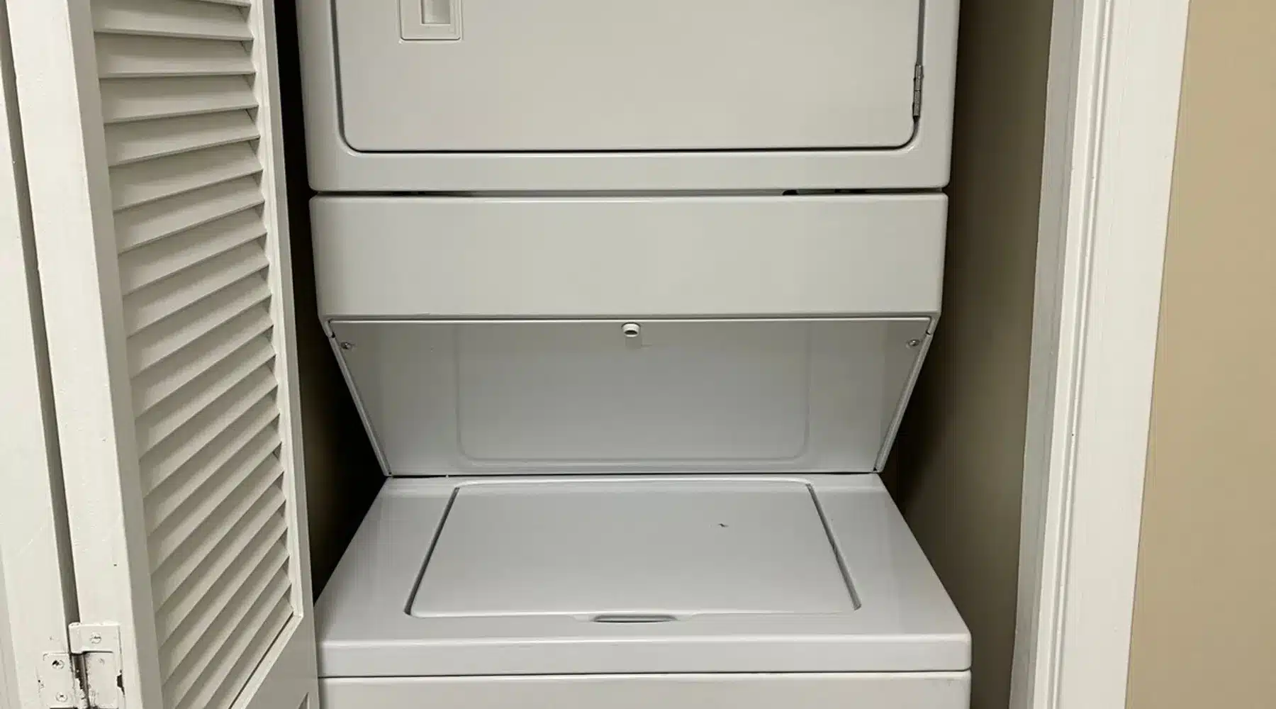 Secondary bedroom has a washer and dryer.