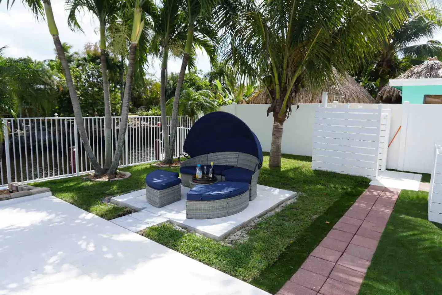 Enjoy Tropical patio with large heated saltwater pool and 70ft deck with room for 60ft boat with water and power available.
