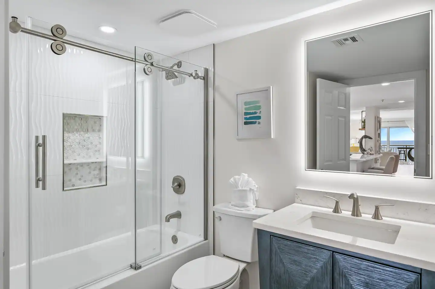 Soak in the bathtub with this spacious bathroom.